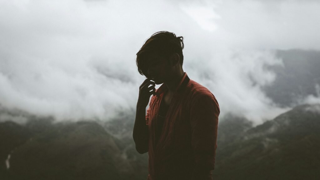 Man in misty mountains