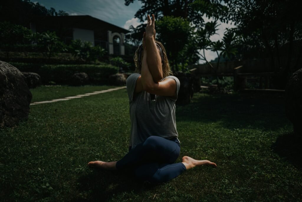 Person doing yoga in the yard