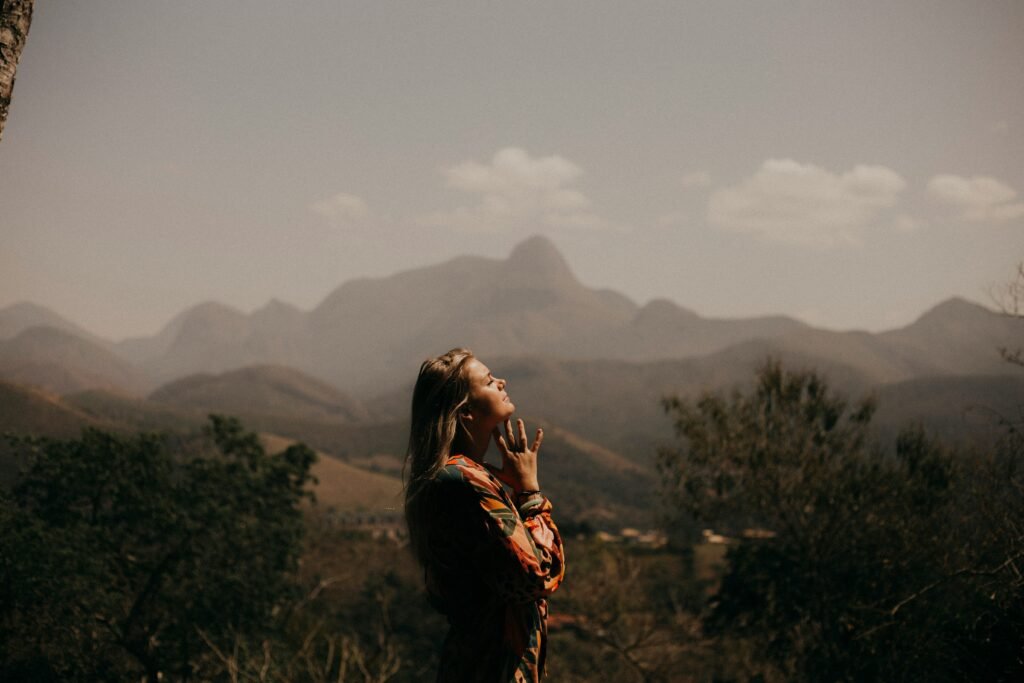 Woman in the mountain haze with a smile 