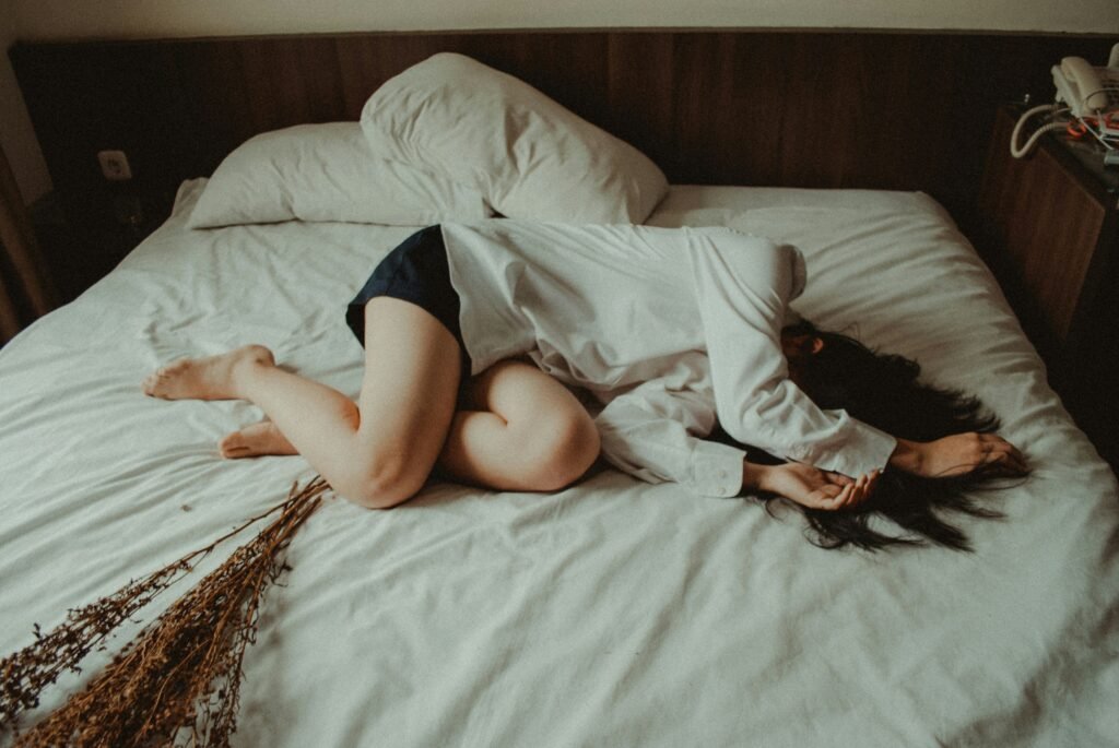 Woman depressed in bed